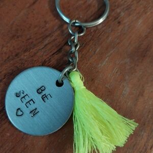 Chic Silver Keychain with Neon Yellow Tassel